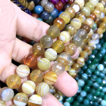 CAG1038 Banded Agate Beads Faceted Round 10mm 15" Strand