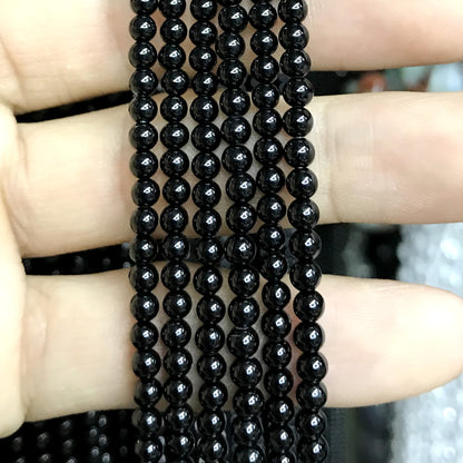 CAG492 Black Agate Beads Smooth Round 4mm 15" Strand