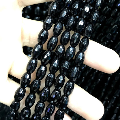 CAG760 Black Agate Beads Faceted Rice 6x9mm 15" Strand