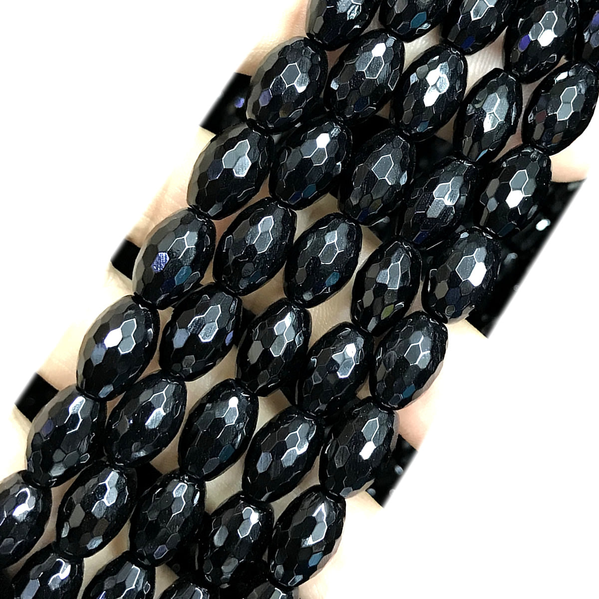 CAG761 Black Agate Beads Faceted Rice 8x12mm 15" Strand