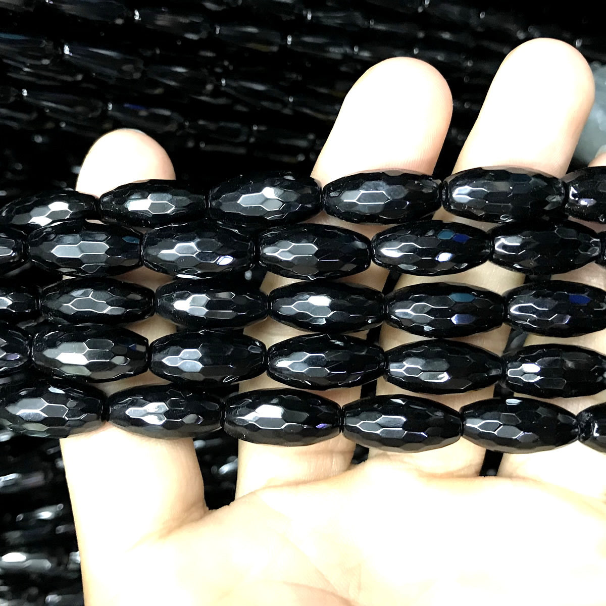 CAG762 Black Agate Beads Faceted Rice 6x16mm 15" Strand