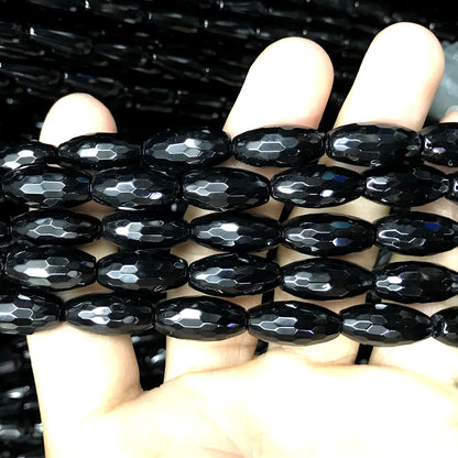 CAG763 Black Agate Beads Faceted Rice 8x16mm 15" Strand