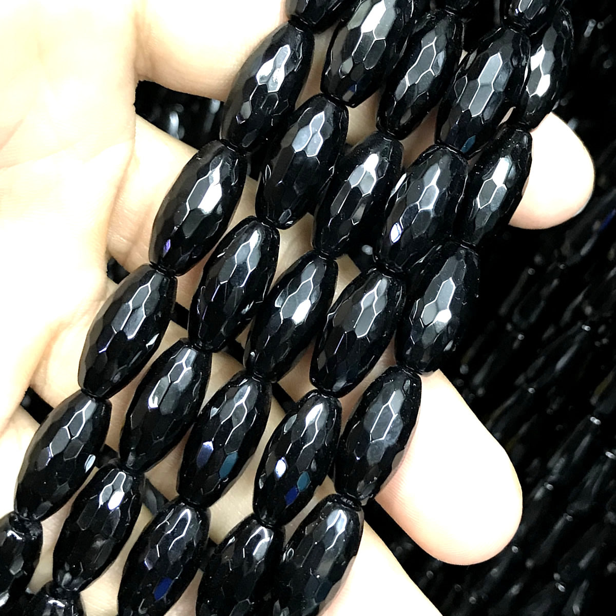 CAG763 Black Agate Beads Faceted Rice 8x16mm 15" Strand