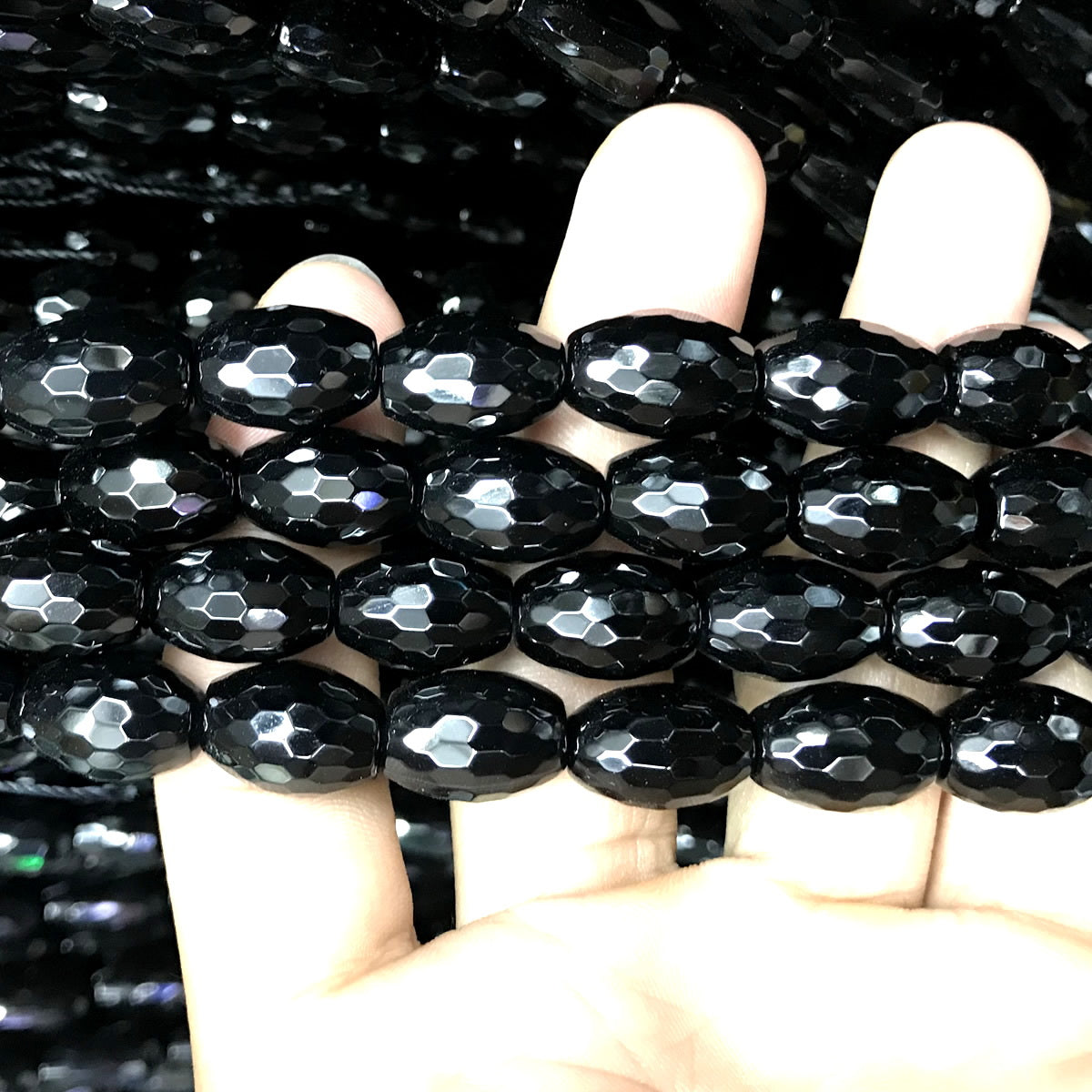 CAG764 Black Agate Beads Faceted Rice 10x14mm 15" Strand