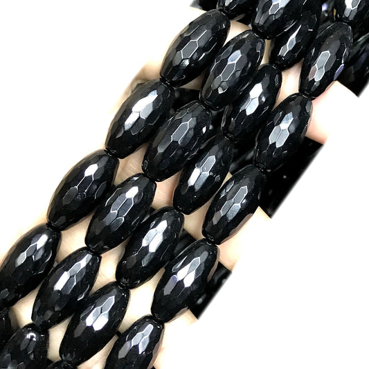 CAG765 Black Agate Beads Faceted Rice 10x20mm 15" Strand