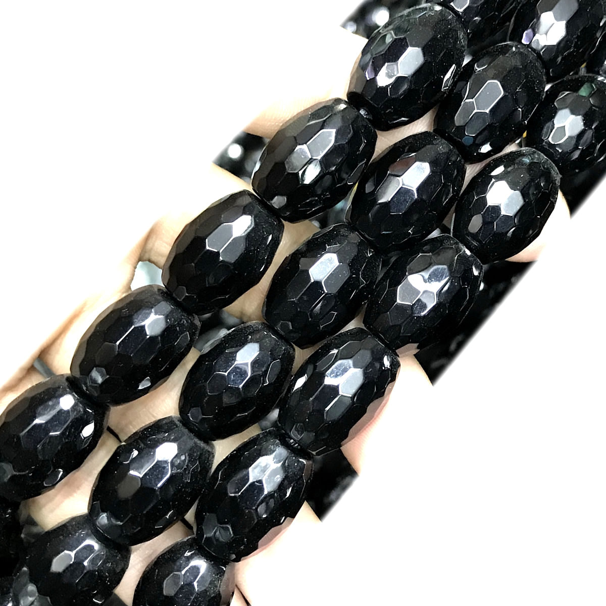 CAG767 Black Agate Beads Faceted Rice 15x20mm 15" Strand