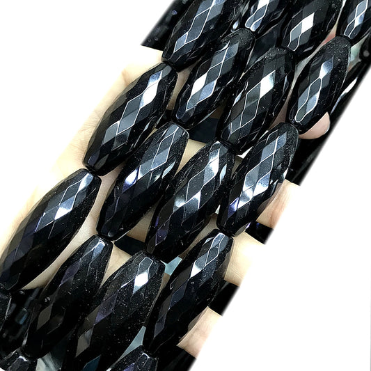 CAG768 Black Agate Beads Faceted Rice 10x30mm 15" Strand