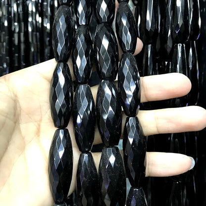 CAG768 Black Agate Beads Faceted Rice 10x30mm 15" Strand