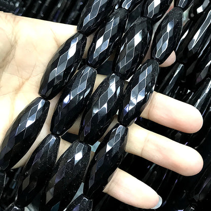 CAG768 Black Agate Beads Faceted Rice 10x30mm 15" Strand