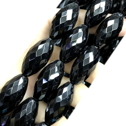 CAG769 Black Agate Beads Faceted Rice 15x30mm 15" Strand