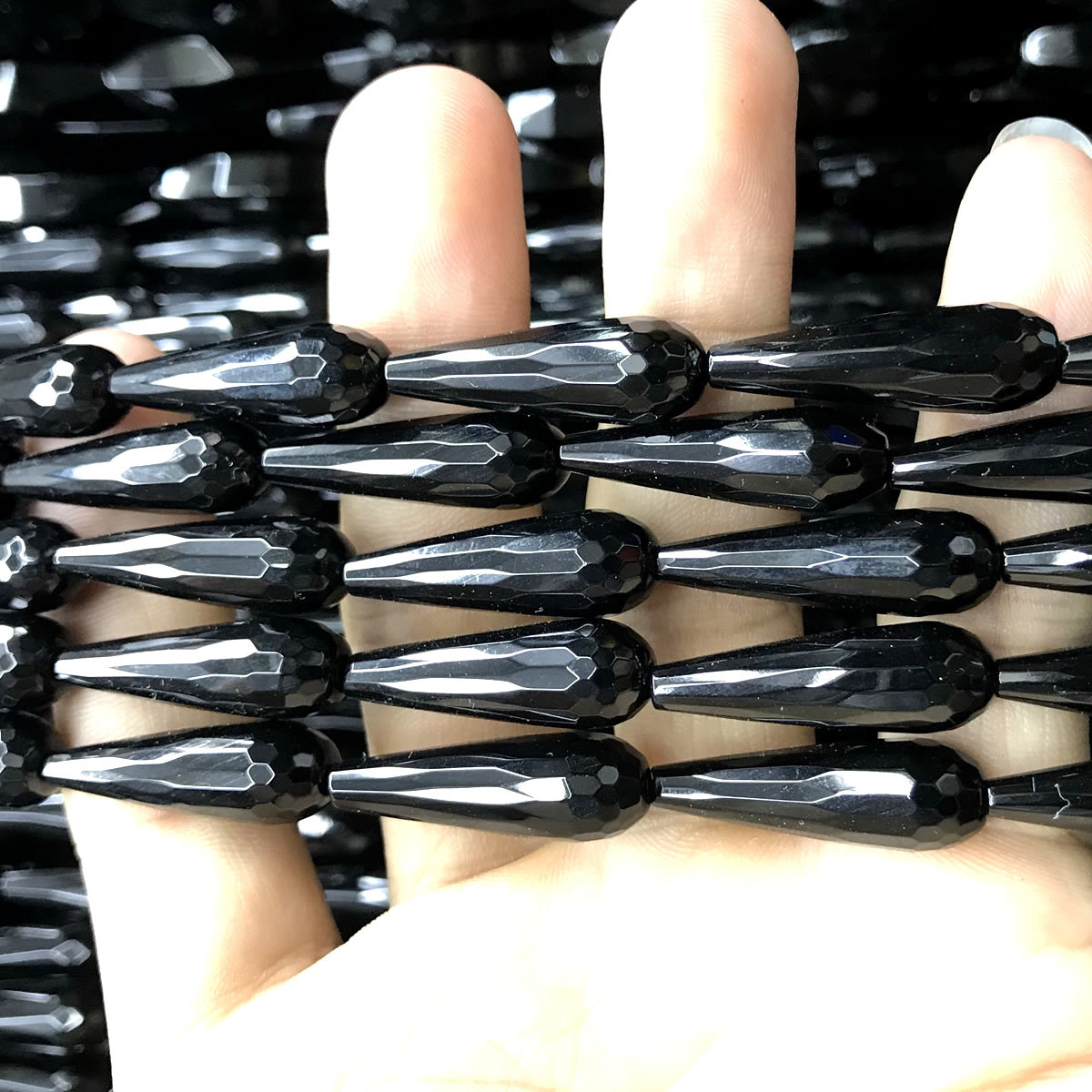 CAG780 Black Agate Beads Faceted Teardrop 8x25mm 15" Strand