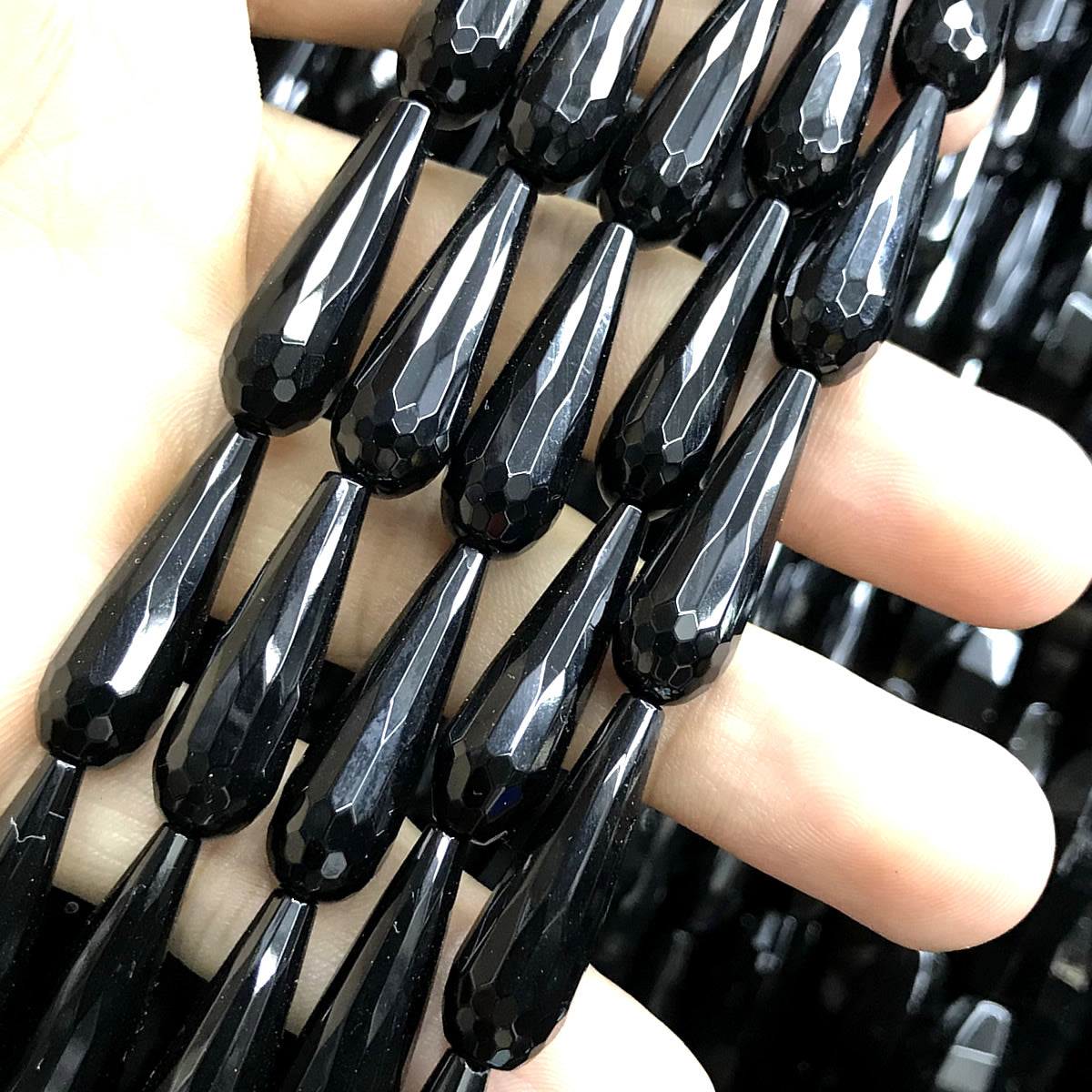 CAG780 Black Agate Beads Faceted Teardrop 8x25mm 15" Strand