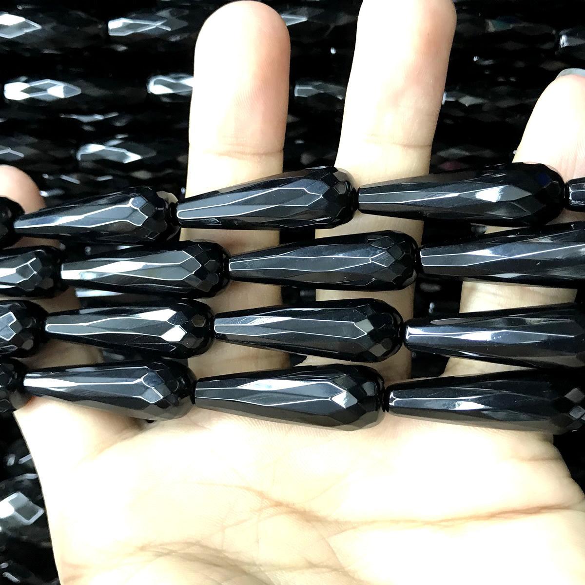 CAG782 Black Agate Beads Faceted Teardrop 10x30mm 15" Strand