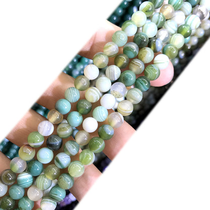 CAG995 Banded Agate Beads Smooth Round 4mm 15" Strand