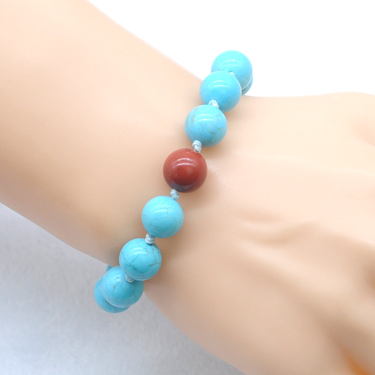 CGB362 Blue Howlite & Red Jasper Adjustable Bracelet Round 12mm