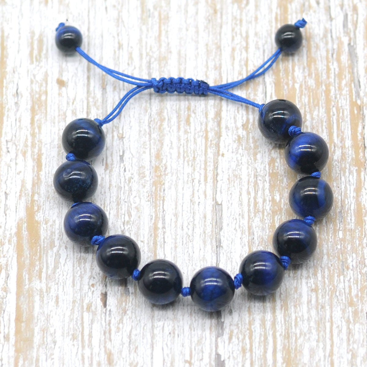 CGB687 Blue Tiger Eye Adjustable Macrame Bracelet Round 12mm