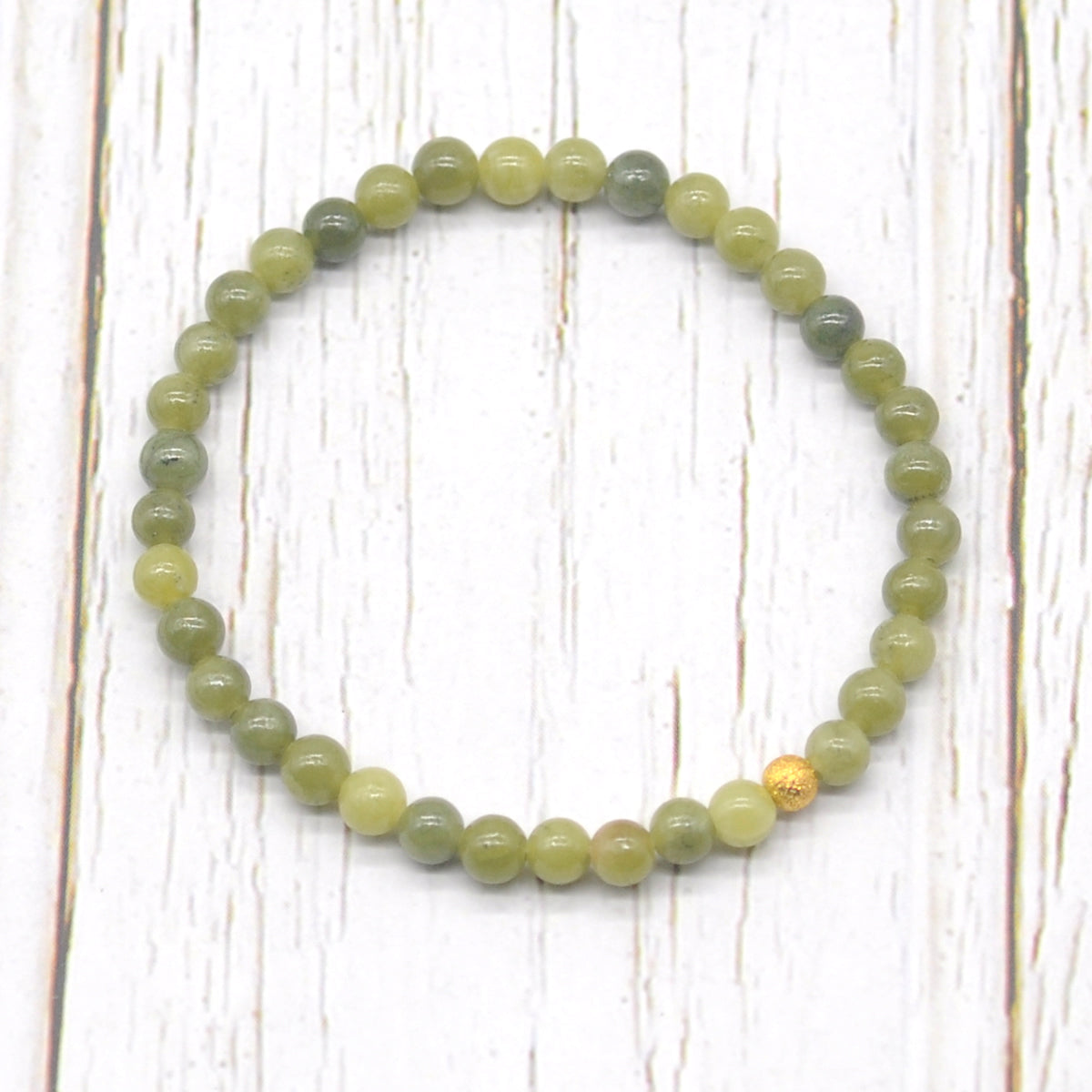 CGB743 Canadian Jade Beaded Stretch Bracelet Round 4mm