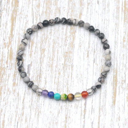 CGB925 Black Net Jasper With 7 Chakra Stretch Bracelet Round 4mm