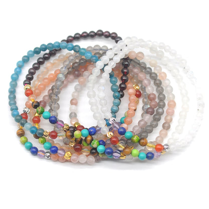 CGB950 White Moonstone With 7 Chakra Stretch Bracelet Round 4mm