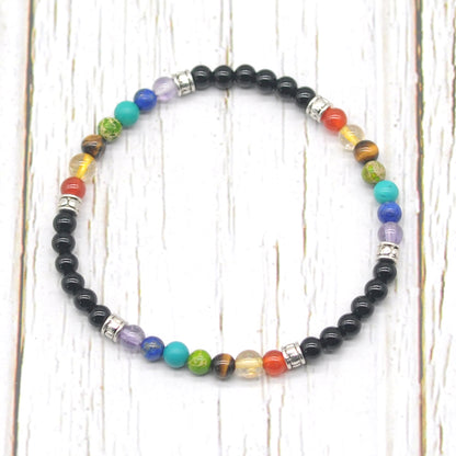 CGB965 Black Onyx With 7 Chakra Stretch Bracelet Round 4mm