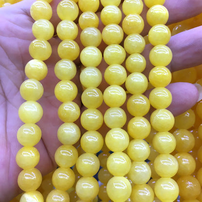 CJA186 Dyed Yellow Jade Beads Smooth Round 8mm 15" Strand