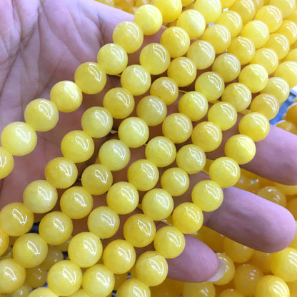 CJA186 Dyed Yellow Jade Beads Smooth Round 8mm 15" Strand