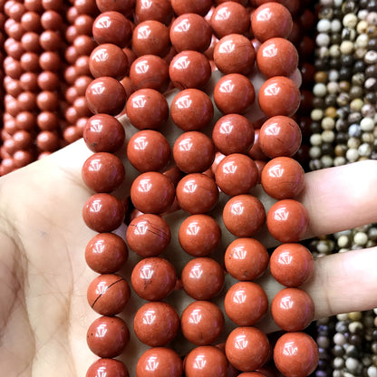 CJP468 Red Jasper Beads Smooth Round 10mm 15" Strand