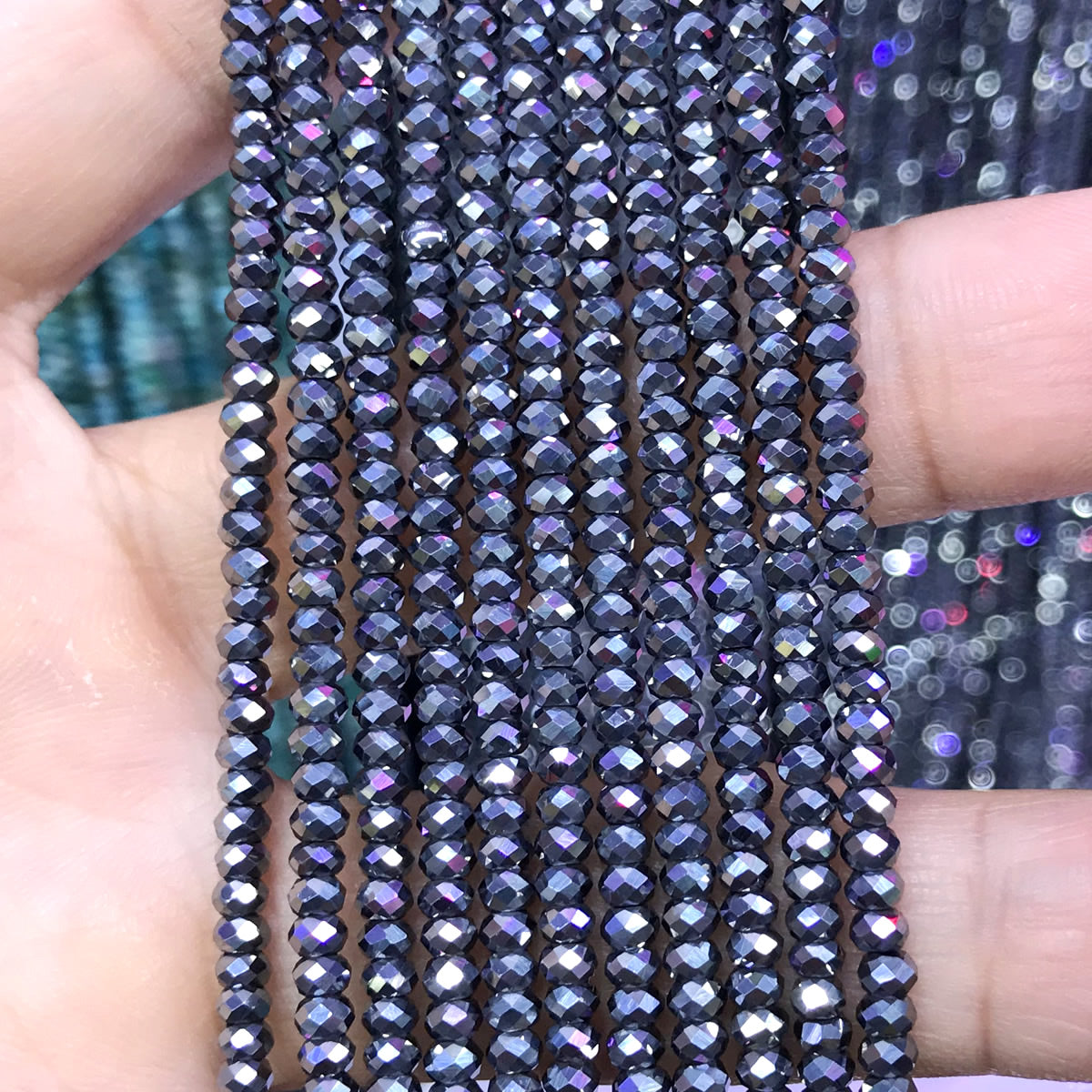 CRB21 Terahertz Beads Faceted Rondelle 2x3mm 15" Strand