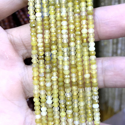 CRB25 Yellow Opal Beads Faceted Rondelle 2x3mm 15" Strand