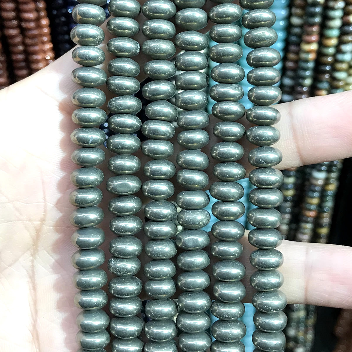 CRB294 Pyrite Beads Smooth Rondelle 5x8mm 15" Strand