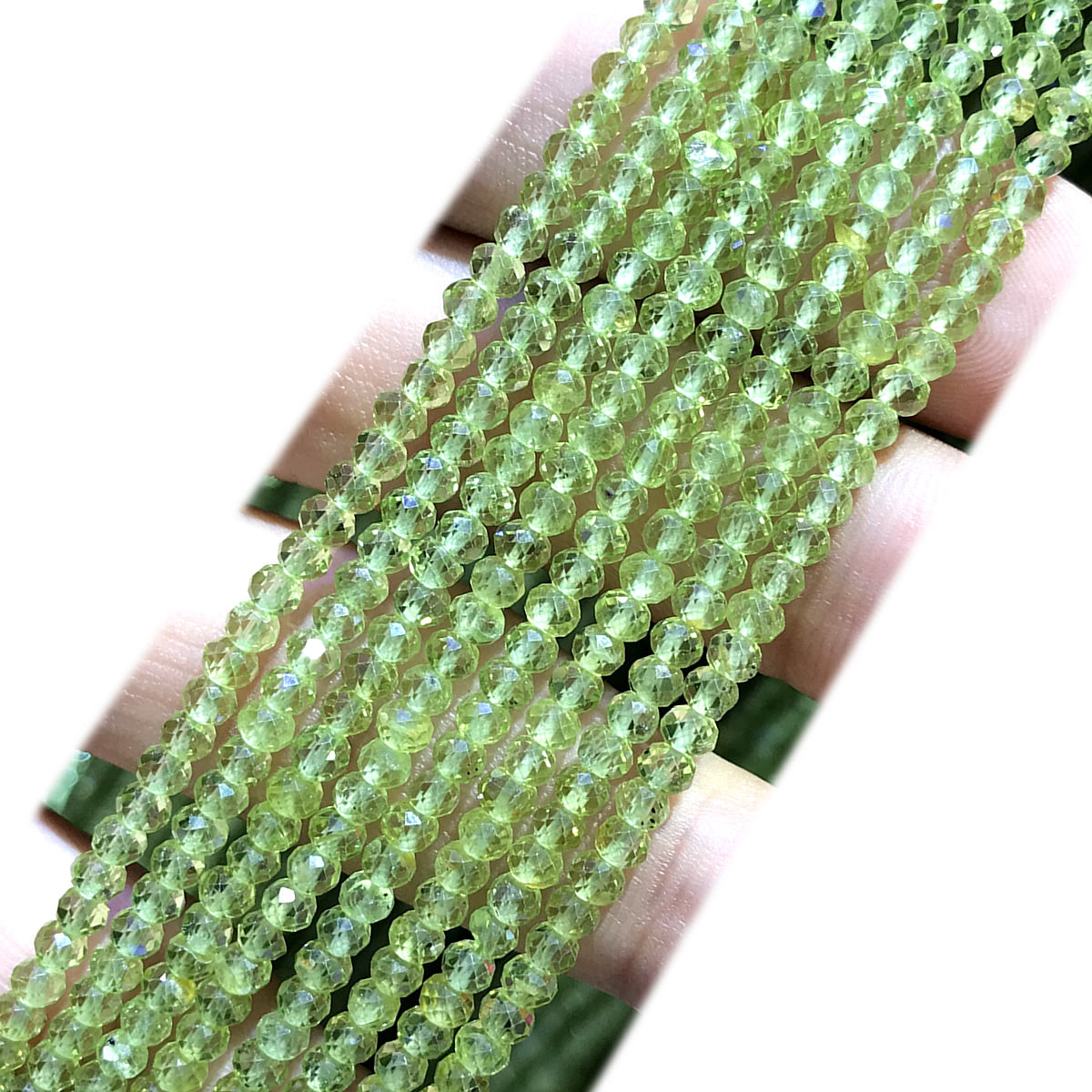 CRB396 Peridot Gemstone Beads Faceted Rondelle 2x3mm 15" Strand