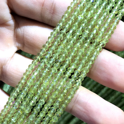 CRB396 Peridot Gemstone Beads Faceted Rondelle 2x3mm 15" Strand