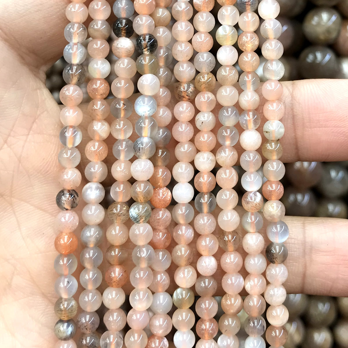 CSS35 Sunstone Beads Smooth Round 4mm 15" Strand