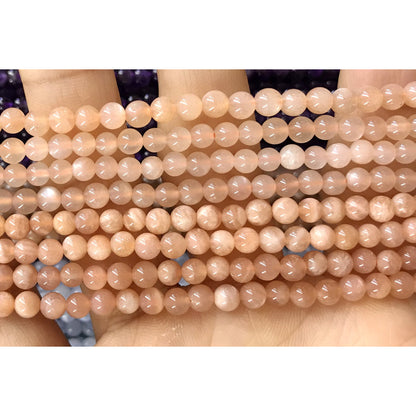 CTG06 Orange Moonstone Beads Smooth Round 4mm 15" Strand