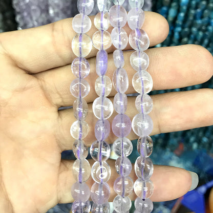 CNG01 Light Amethyst Beads Smooth Nugget 6x8mm 15" Strand