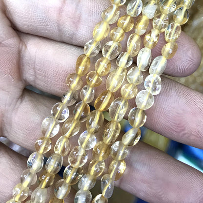 CNG10 Citrine Gemstone Beads Smooth Nugget 5x7mm 15" Strand