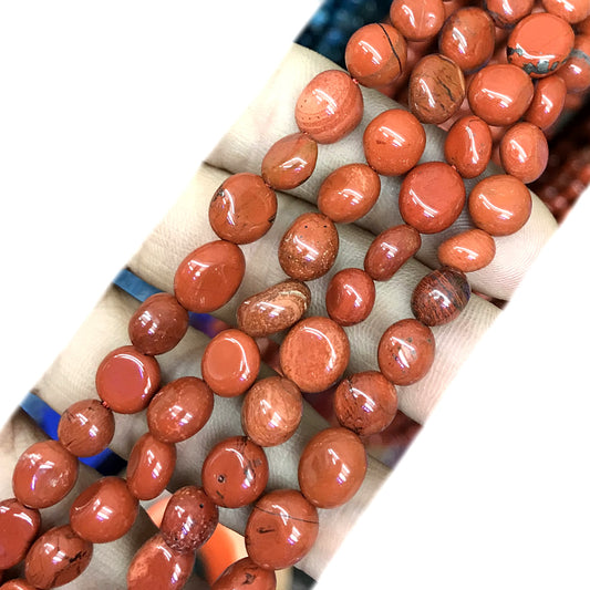 CNG24 Red Jasper Beads Smooth Nugget 6x8mm 15" Strand