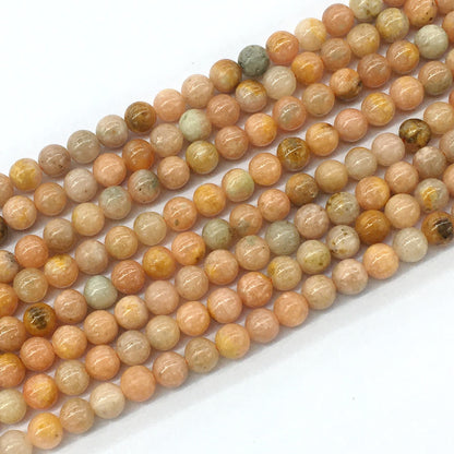 CCA02 Peach Calcite Beads Smooth Round 6mm 15.5" Strand