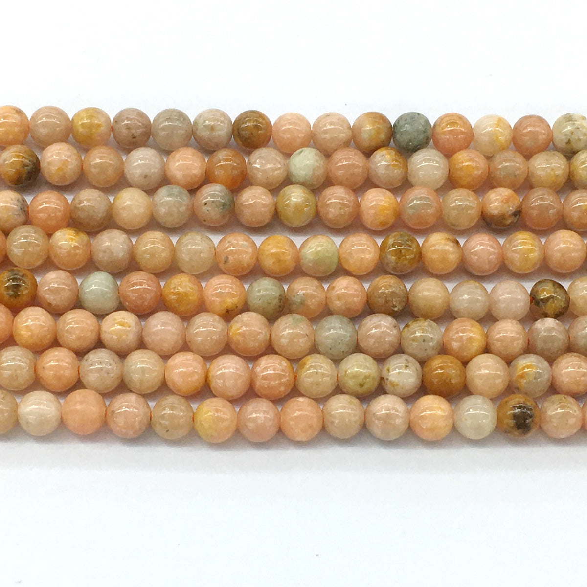 CCA02 Peach Calcite Beads Smooth Round 6mm 15.5" Strand