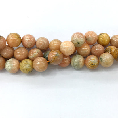 CCA06 Peach Calcite Beads Smooth Round 14mm 15.5" Strand