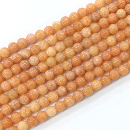 CCA11 Peach Calcite Beads Smooth Round 6mm 15.5" Strand