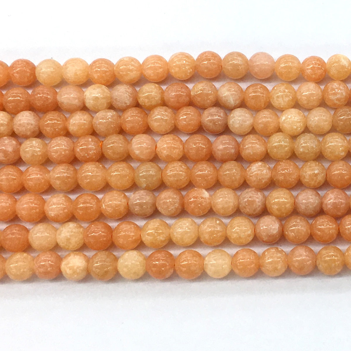 CCA11 Peach Calcite Beads Smooth Round 6mm 15.5" Strand