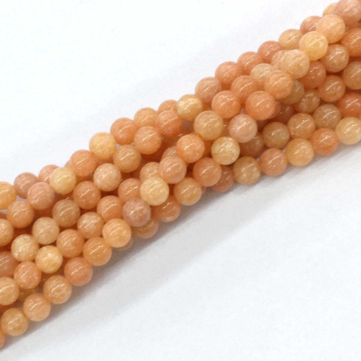 CCA11 Peach Calcite Beads Smooth Round 6mm 15.5" Strand