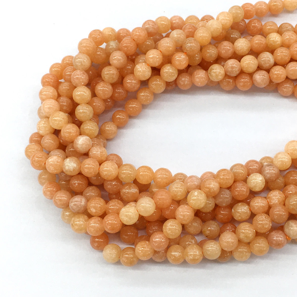 CCA11 Peach Calcite Beads Smooth Round 6mm 15.5" Strand