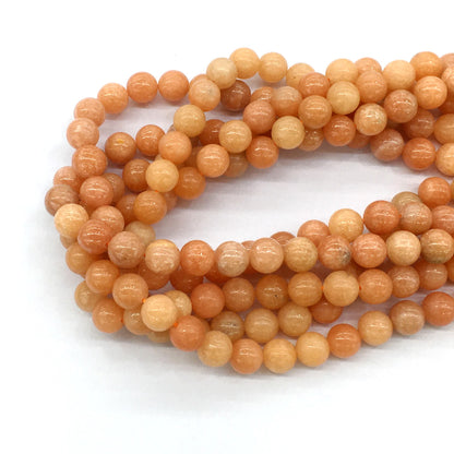 CCA12 Peach Calcite Beads Smooth Round 8mm 15.5" Strand