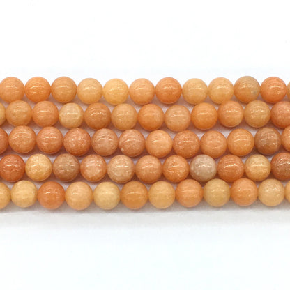 CCA14 Peach Calcite Beads Smooth Round 10mm 15.5" Strand