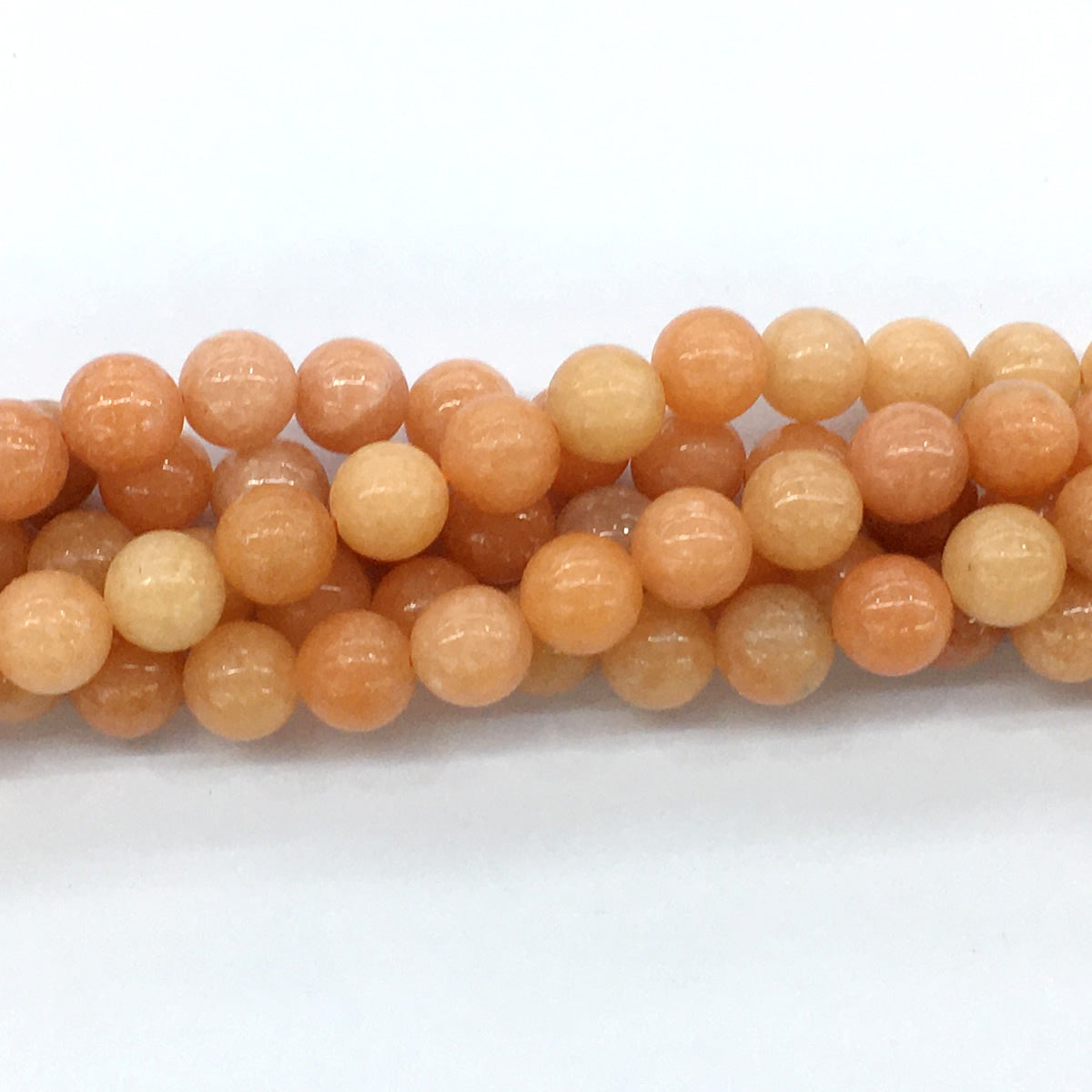 CCA14 Peach Calcite Beads Smooth Round 10mm 15.5" Strand