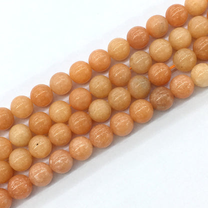 CCA15 Peach Calcite Beads Smooth Round 12mm 15.5" Strand