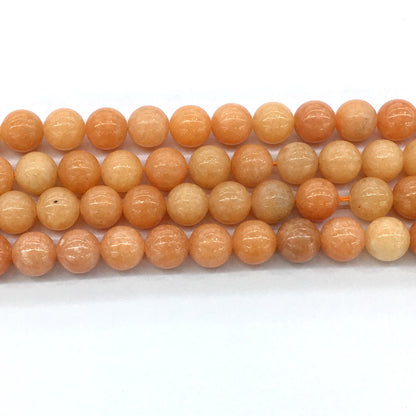 CCA15 Peach Calcite Beads Smooth Round 12mm 15.5" Strand