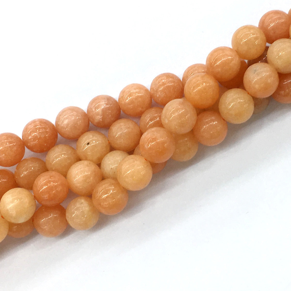 CCA15 Peach Calcite Beads Smooth Round 12mm 15.5" Strand